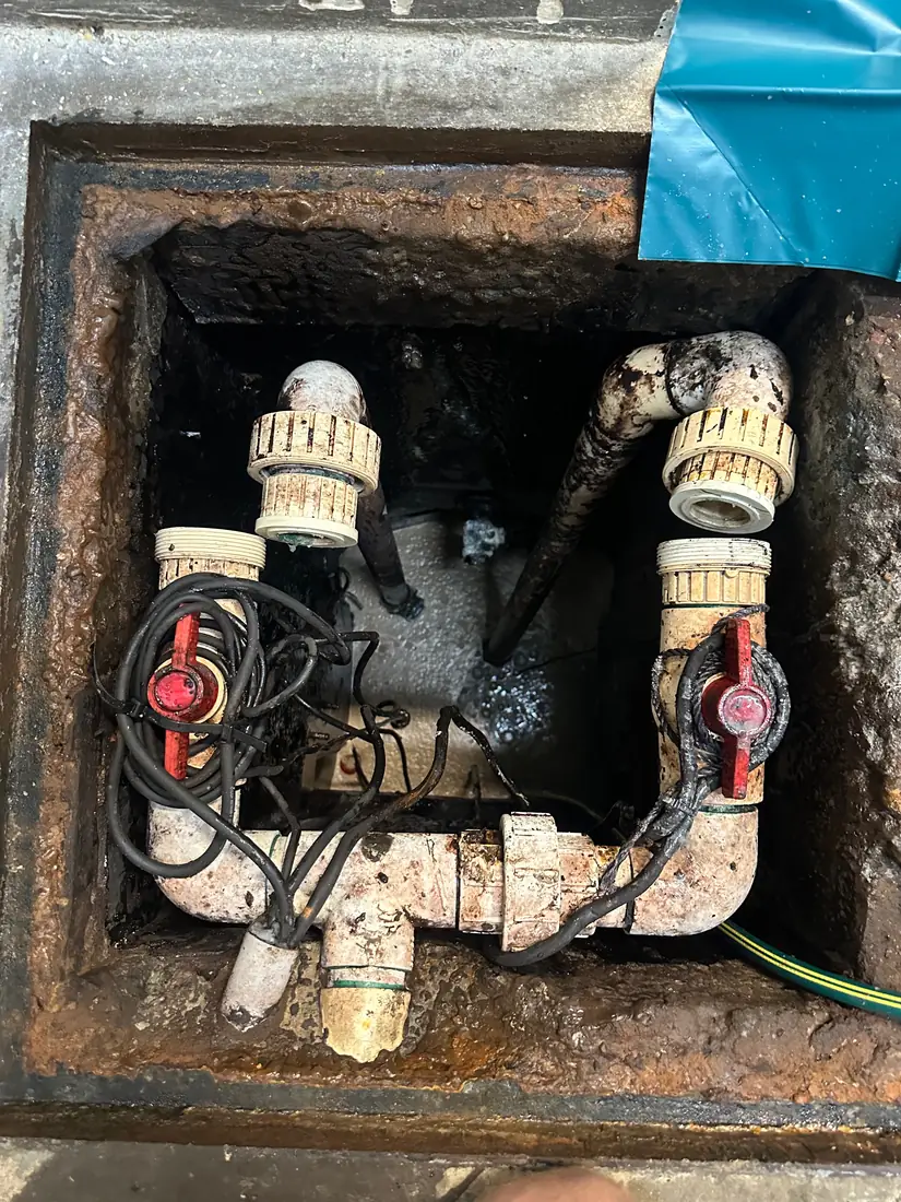 The Sydney grease trap pit with both pumps cleaned, reinstalled and reconnected to the valves and camlocks