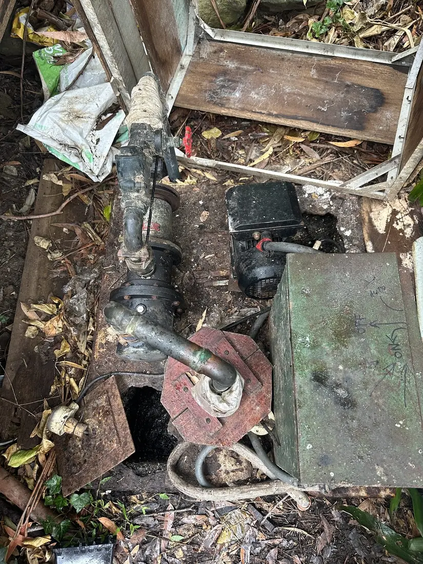 An old sewer pump and its control box removed from a Sydney property at the end of its working life