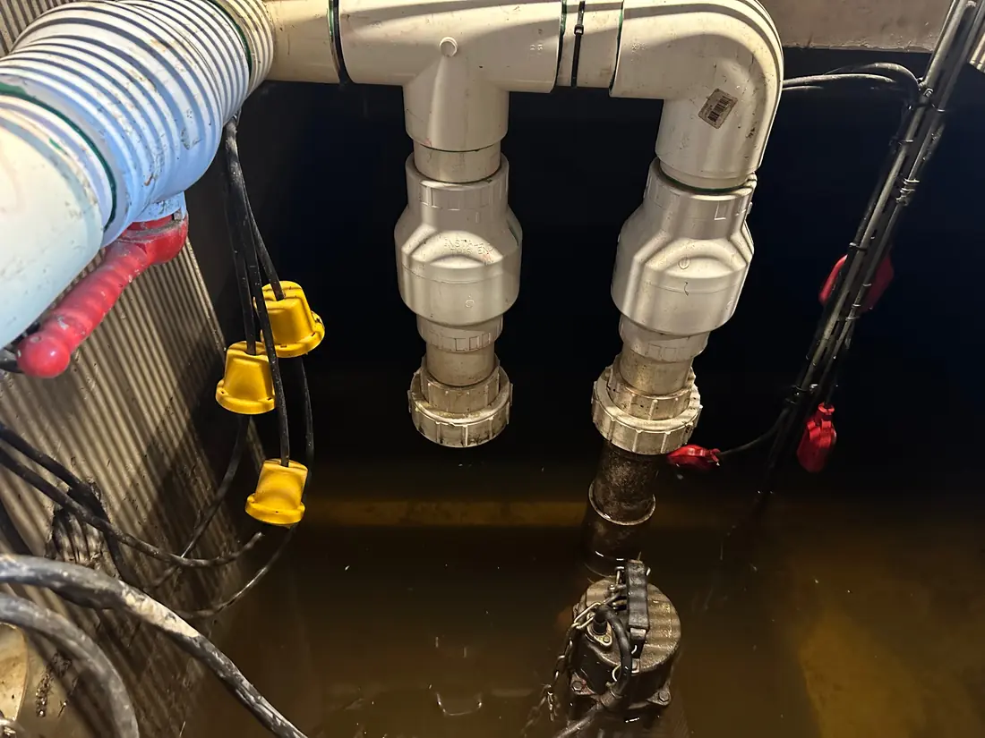An oversized Ultraflow stormwater pump on 80mm pump-out pipework in a Sydney pit, far larger than the duty required