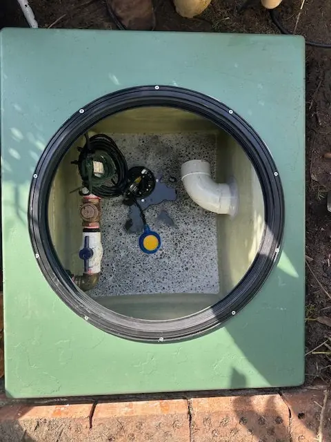 Sewer pump installation Sydney — fibreglass pit with gas-tight lid, new pump, discharge pipework and isolation valve, professionally installed