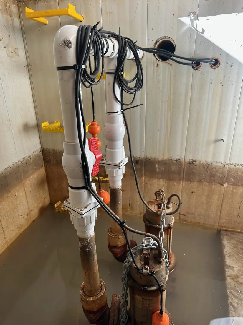 The same Ryde pump pit after tidying — cabling secured and float reattached so it swings freely